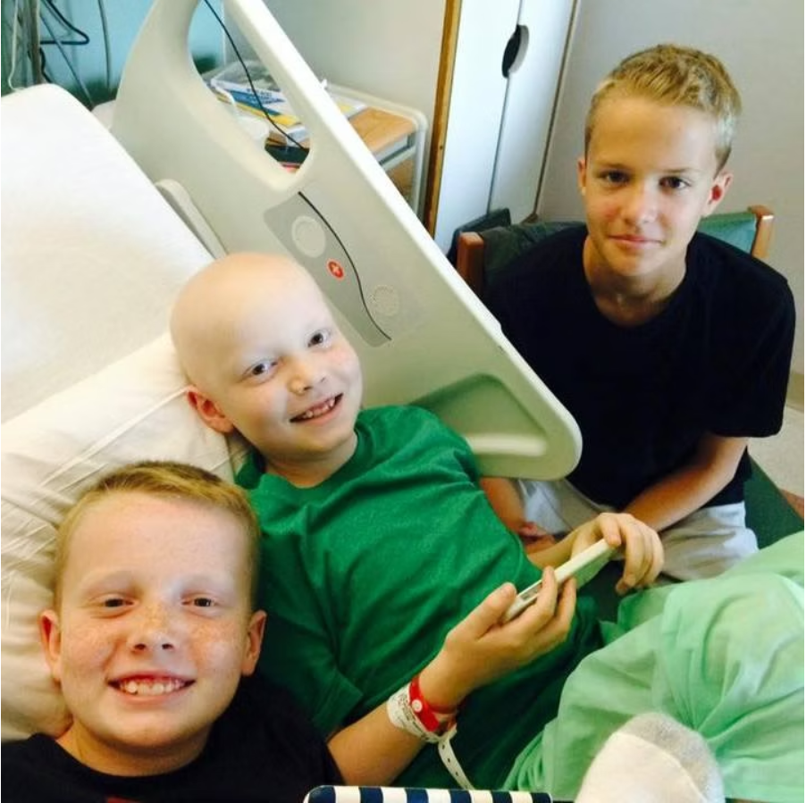 Our boys with their brother at the hospital